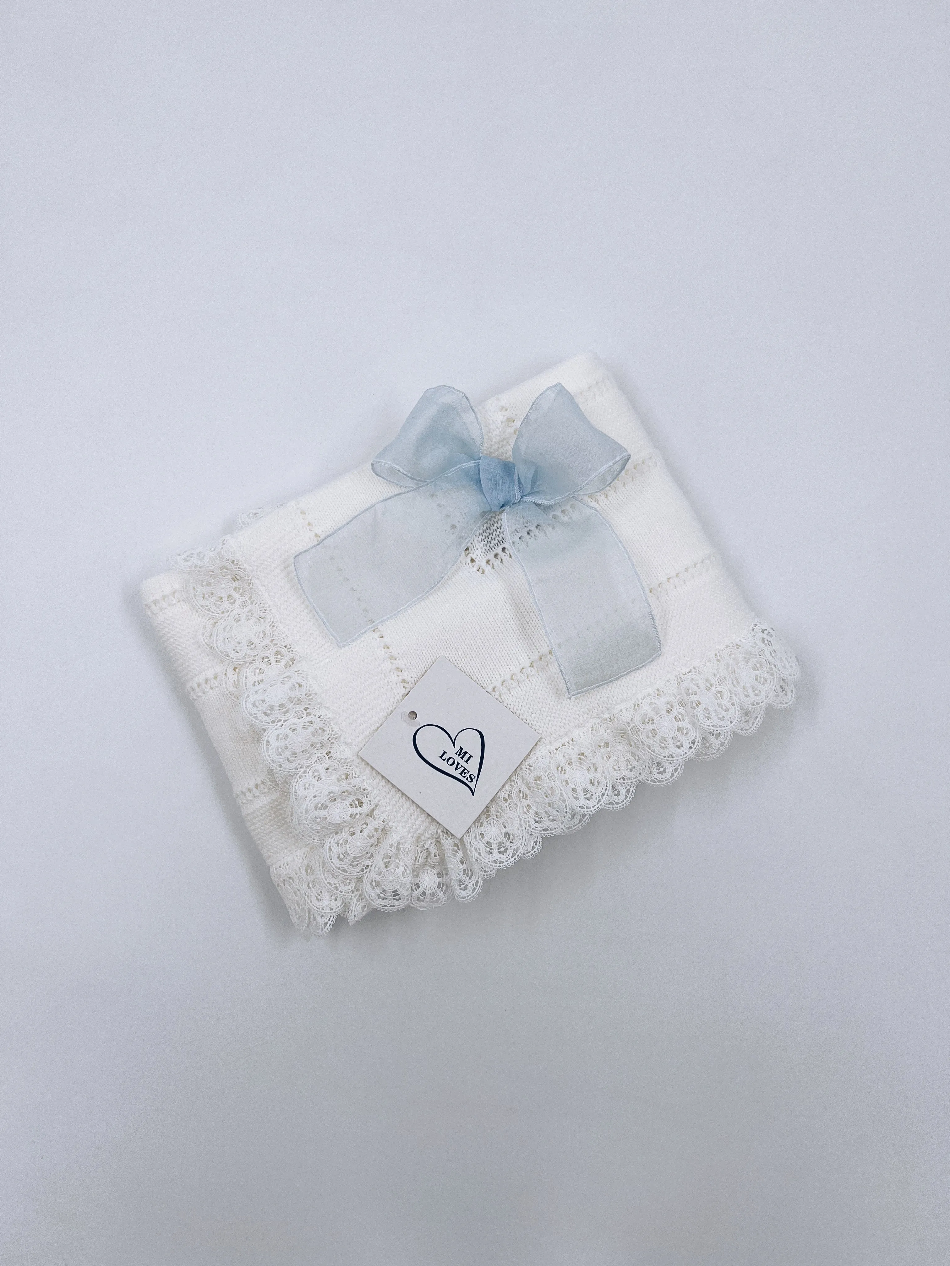 Beautiful Ivory knitted blanket with Dusty Blue bow and lace trim(98cm).Suitable for boys and girls.