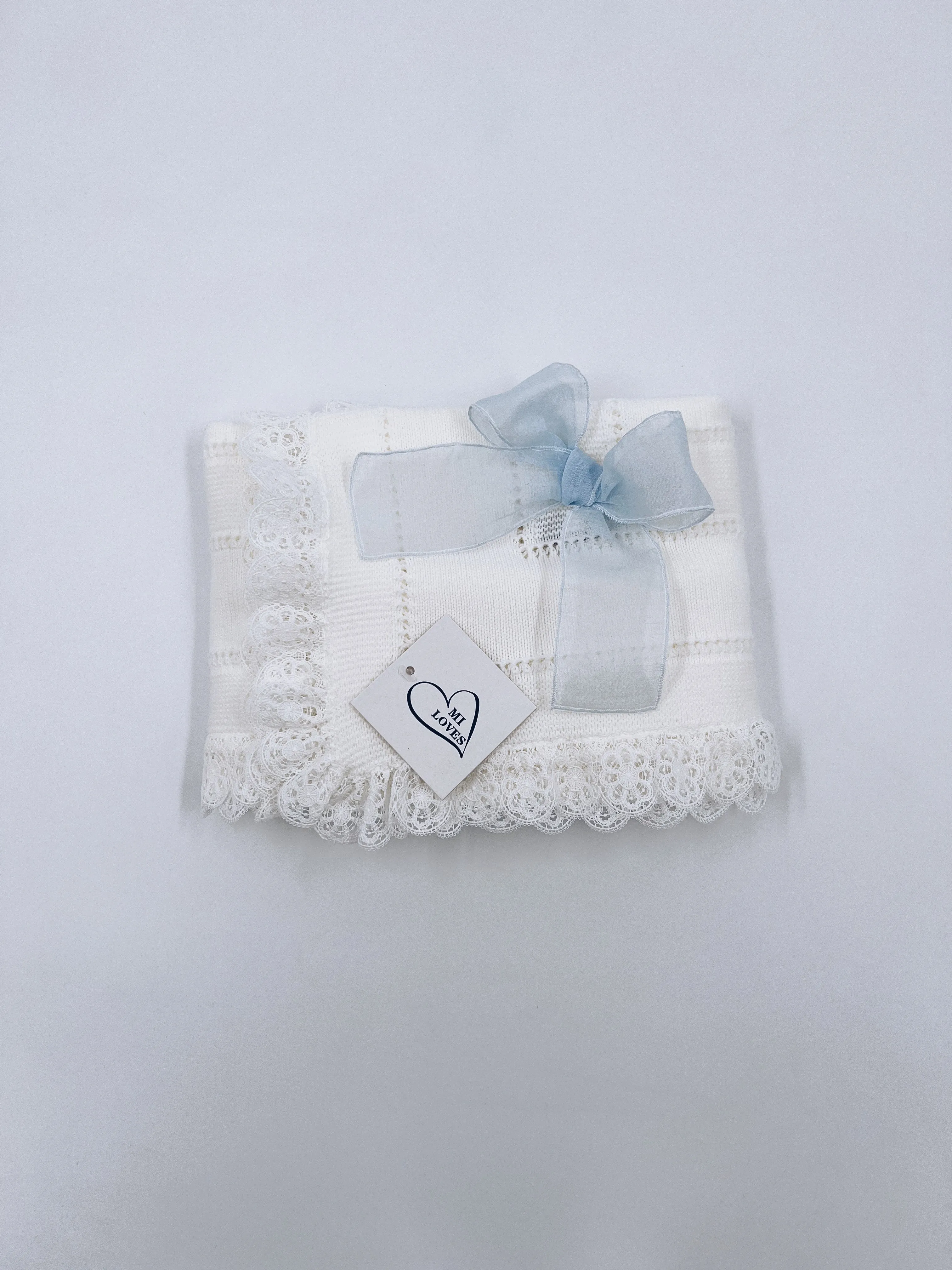 Beautiful Ivory knitted blanket with Dusty Blue bow and lace trim(98cm).Suitable for boys and girls.