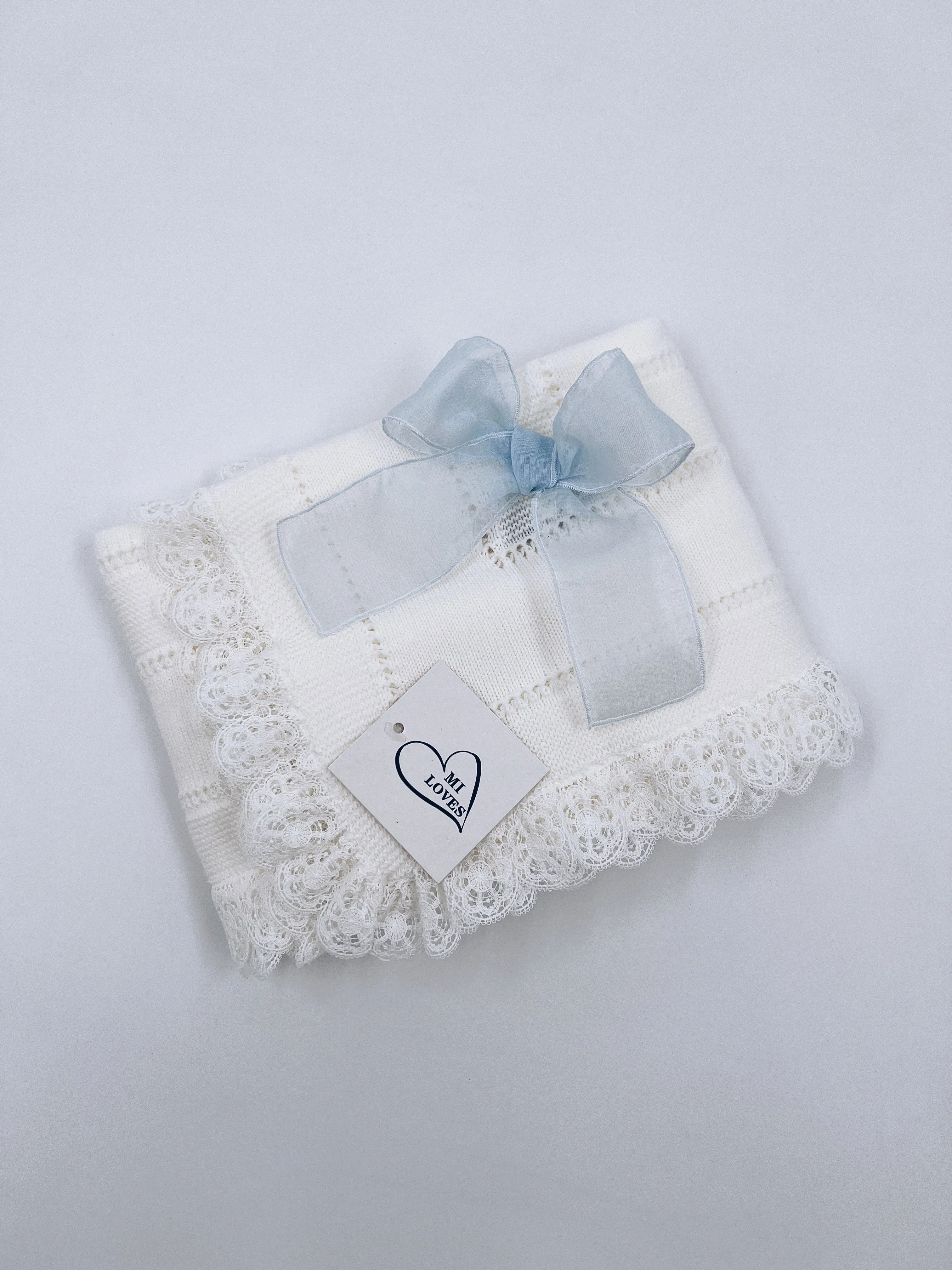 Beautiful Ivory knitted blanket with Dusty Blue bow and lace trim(98cm).Suitable for boys and girls.
