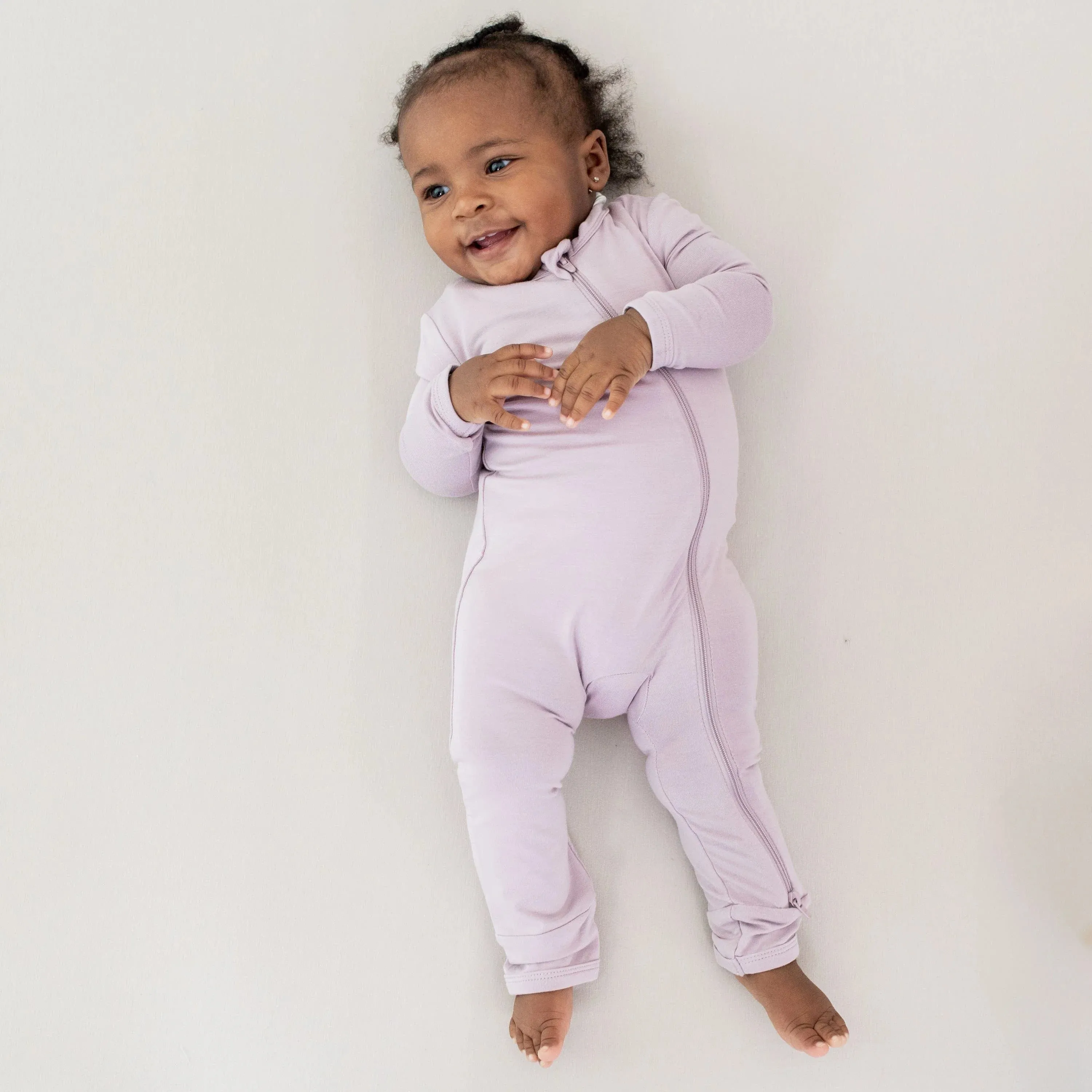 Kyte Baby Zippered Romper - Wisteria