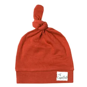 Rust Top Knot Hat